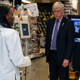 Dr. Kizzmekia Corbett, left, senior research fellow and scientific lead for coronavirus vaccines and immunopathogenesis team in the Viral Pathogenesis Laboratory, talks with President Donald Trump (not pictured) as he tours the Viral Pathogenesis Laboratory at the National Institutes of Health in Bethesda, Md.